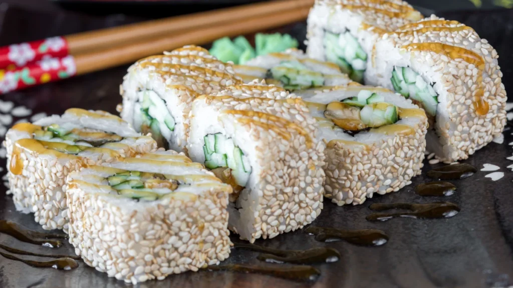 Uramaki sushi rolls with rice on the outside